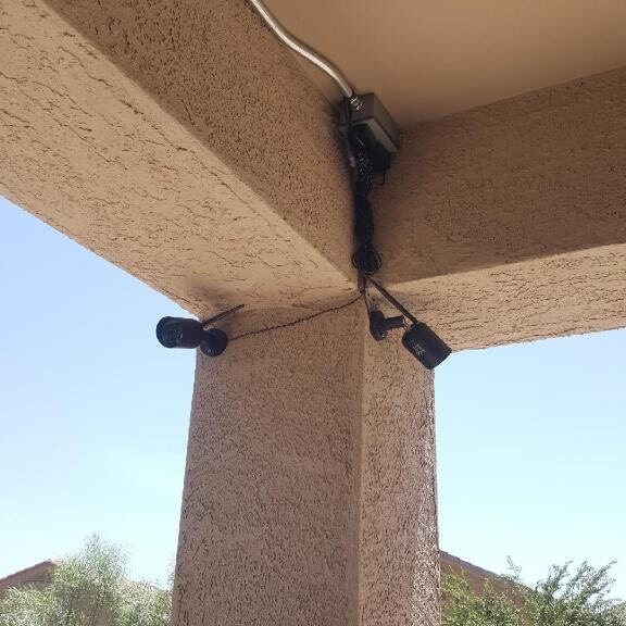 Two security camera installed on patio.