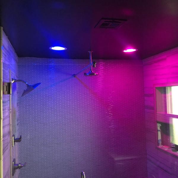 Lights installed inside shower.