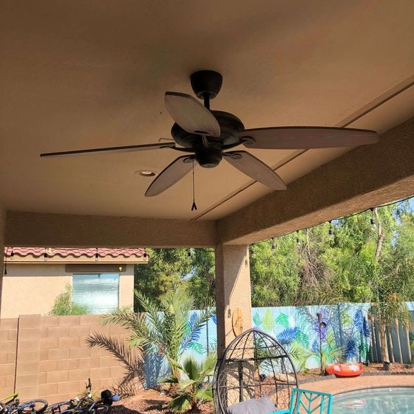 Ceiling fan installed on patio.