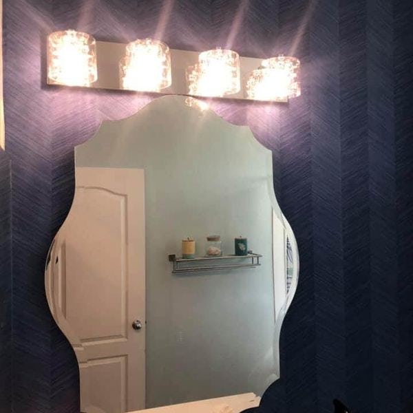 Vanity light installed above mirror.